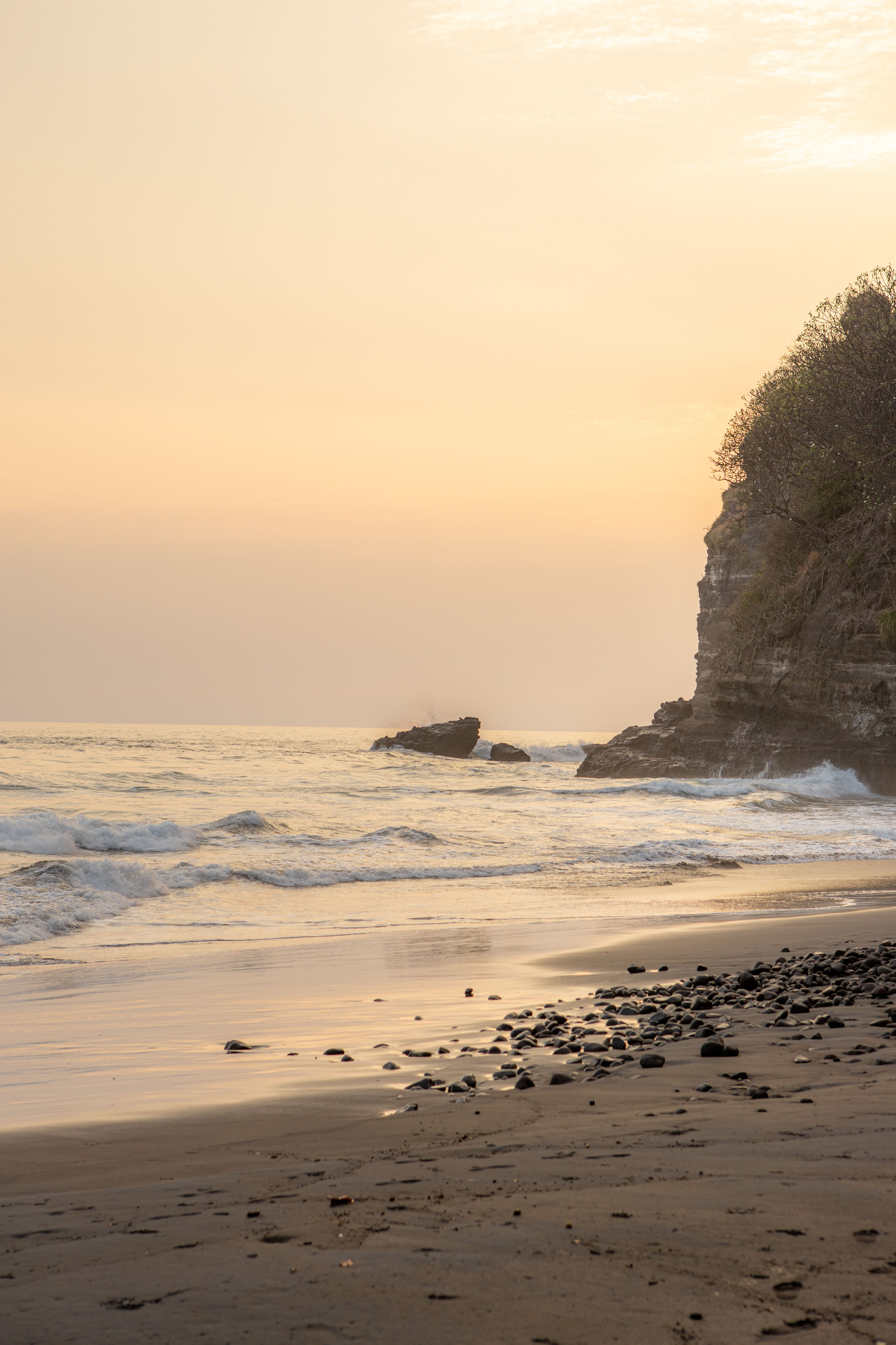 Beach and cliffs at sunset, El Salvador Pacific Coast
